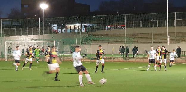 Un lance del partido Academia-Torpedo 66 1